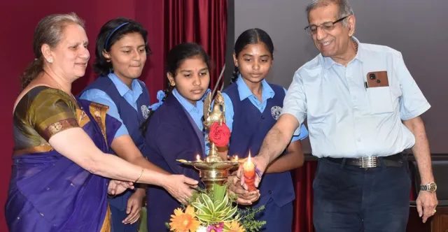 Students and dignitaries lighting the lamp at the National Science Day event at CSIR-CFTRI