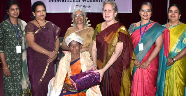 Women scientists and guests on stage at the International Women's Day celebration at CSIR-CFTRI